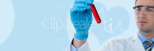 Composite image of doctor in protective glasses and surgical mask holding test tube