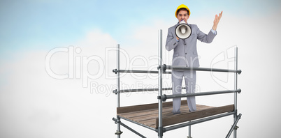 Composite image of architect with hard hat shouting with a megaphone 3d