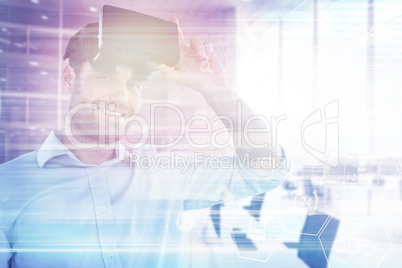 Composite image of portrait of man with virtual reality headset 3d