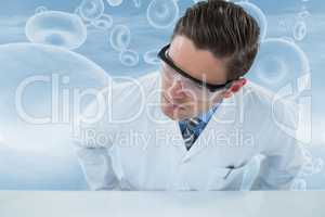 Composite image of doctor wearing protective eyewear 3d