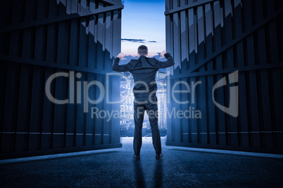 Composite image of businessman standing with hands up 3d