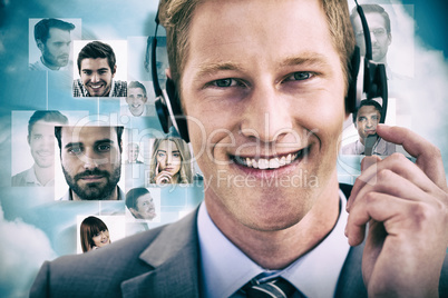 Composite image of handsome agent wearing headset