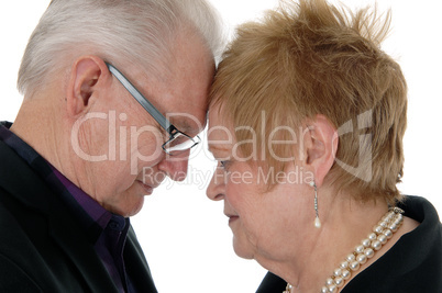 Couple with forehead together.