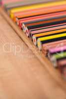 Close-up of colored pencil in a row