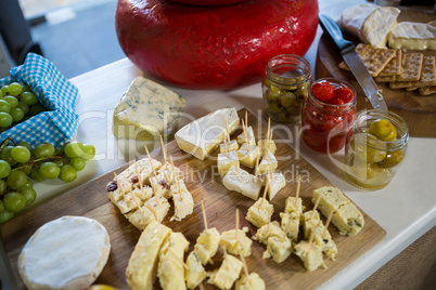 Various types of cheese at counter