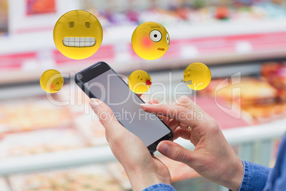 Composite image of three dimensional image of various smileys faces reactions 3d
