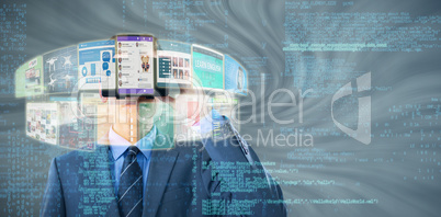 Composite image of businessman in suit using virtual reality headset 3d