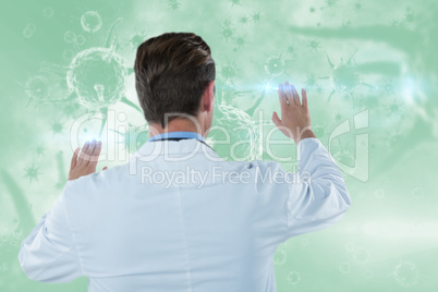 Composite image of rear view of doctor touching transparent interface 3d