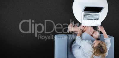 Composite image of woman on her laptop