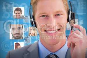 Composite image of handsome agent wearing headset