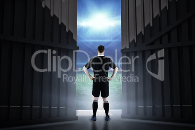 Composite image of rugby player holding a rugby ball 3d