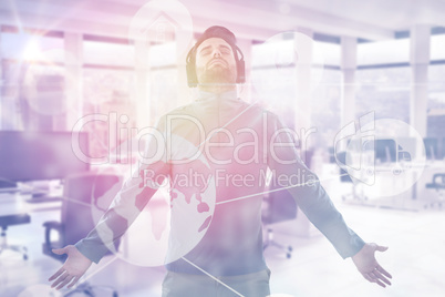 Composite image of man with arms outstretched while listening music 3d
