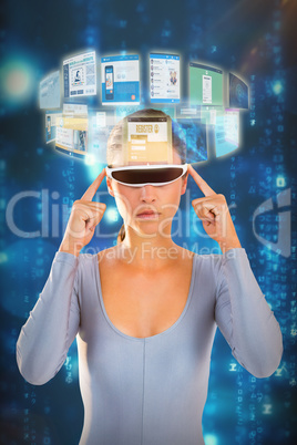 Composite image of woman using virtual video glasses 3d