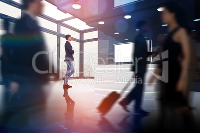 Composite image of businessman standing