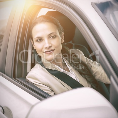 Woman driving and looking away