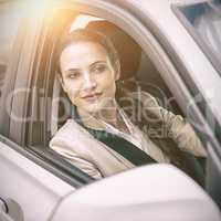 Woman driving and looking away