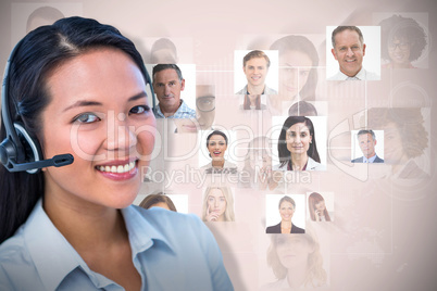 Composite image of smiling businesswoman using headset