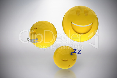 Composite image of three dimensional image of different emoticons 3d