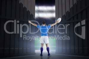 Composite image of rugby player about to throw a rugby ball 3d
