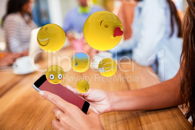Composite image of three dimensional image of basic emoticons 3d