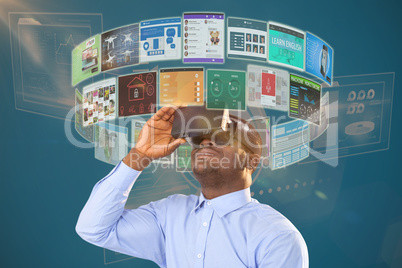 Composite image of man sitting on chair and using virtual reality headset against white background 3