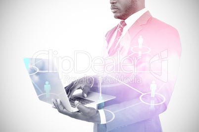 Composite image of midsection of businessman using laptop 3d