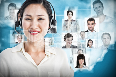 Composite image of beautiful smiling female executive with headset