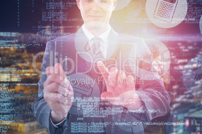 Composite image of businessman using futuristic digital tablet 3d