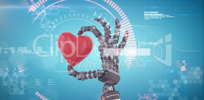 Composite image of 3d image of robot hand holding red heard shape decoration