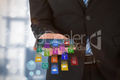 Composite image of midsection of businessman holding mobile phone 3d