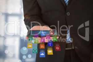 Composite image of midsection of businessman holding mobile phone 3d