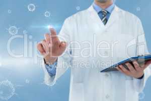 Composite image of doctor holding clipboard while touching transparent interface 3d