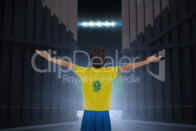 Composite image of football player cheering with arms stretched 3d