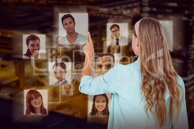 Composite image of hipster pointing with her finger