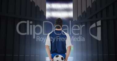 Composite image of rear view of football player holding the ball at back 3d