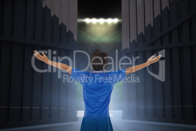 Composite image of football player celebrating with arms stretched 3d