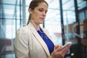 Businesswoman using mobile phone