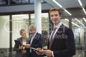 Businessman using digital tablet at office