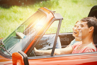 Couple having fun in a car