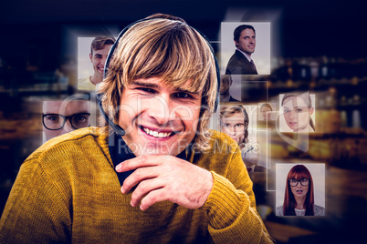 Composite image of smiling hipster businessman using headset