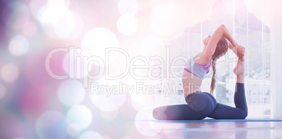 Fit woman stretching body in exercise room