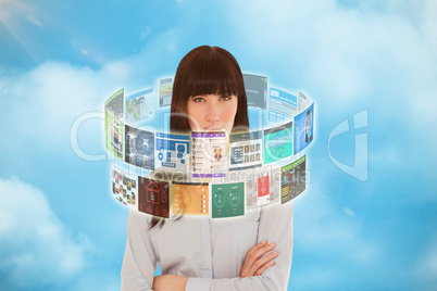 Composite image of woman in her office with her arms crossed  3d