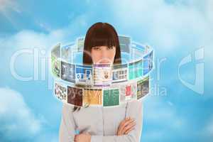 Composite image of woman in her office with her arms crossed  3d