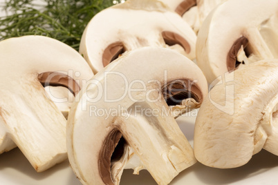 Sliced Champignon mushrooms on a plate