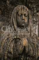 Virgin Mary carved on ancient wooden icon