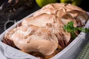 Baked apples with nuts and meringue