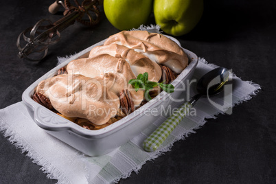 Baked apples with nuts and meringue