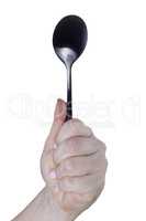 Female hand with a spoon