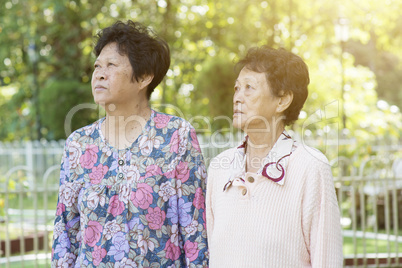 Asian elderly women walking at outdoor
