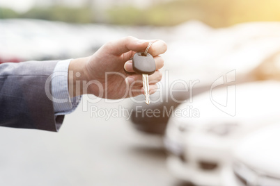 Hand with car key